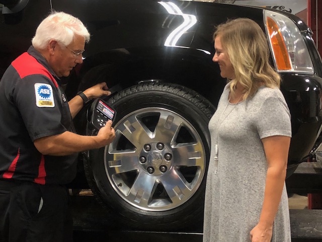 Jeff Buckley, explaining TPMS services to a customer (Owner of My Father's Shop - Midlothian, TX)